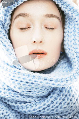 Image of young real blond woman in scarf