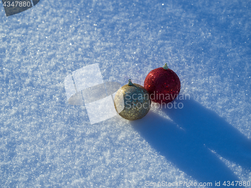 Image of christmas balls decoration in snow