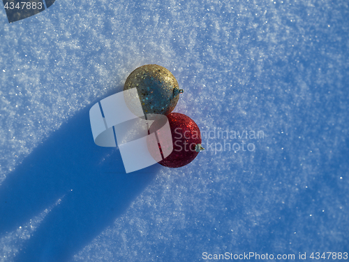 Image of christmas balls decoration in snow