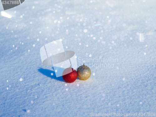 Image of christmas balls decoration in snow