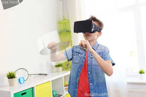 Image of boy in virtual reality headset or 3d glasses