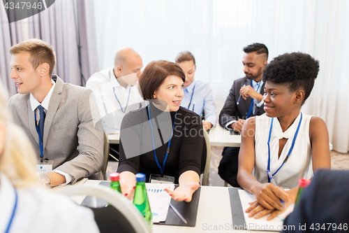 Image of happy business team at international conference