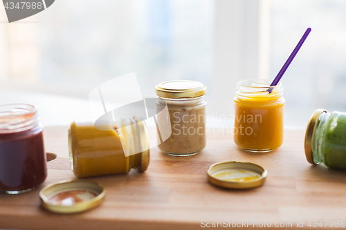 Image of vegetable or fruit puree or baby food in jars