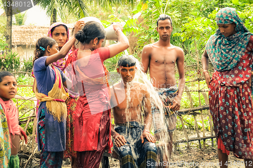 Image of Pouring of water in Bangladesh