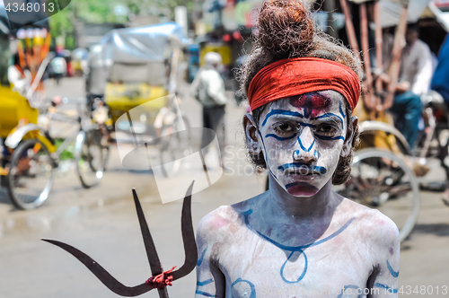 Image of Boy with pitchfork in Assam