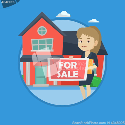 Image of Young female realtor offering house.