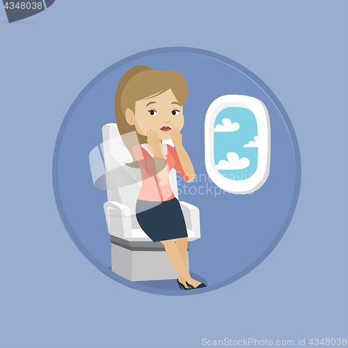 Image of Young woman suffering from fear of flying.