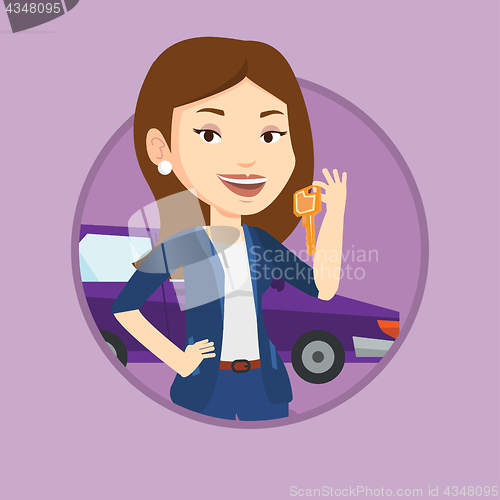 Image of Woman holding keys to her new car.