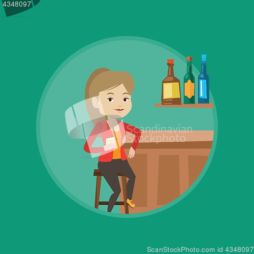 Image of Woman sitting at the bar counter.