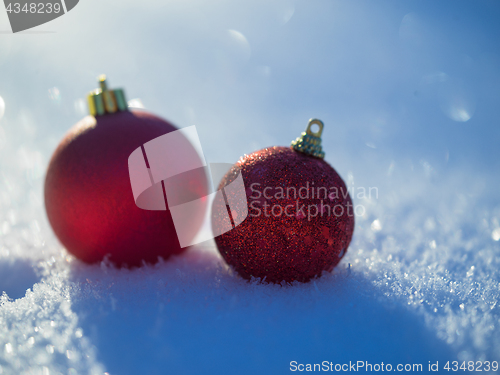 Image of christmas balls decoration in snow