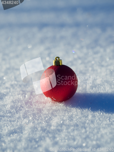 Image of christmas balls decoration in snow