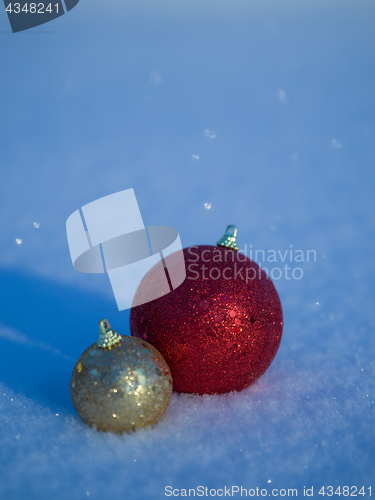 Image of christmas balls decoration in snow