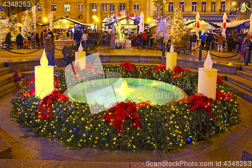 Image of Mandusevac fountain on Ban Jelacic square decorated with advent 