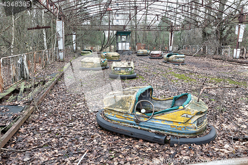 Image of Attraction in amusement park in overgrown ghost city Pripyat.