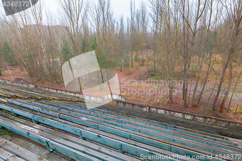 Image of Overgrown stadium in ghost city Pripyat.