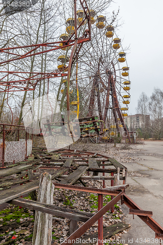 Image of Attraction in amusement park in overgrown ghost city Pripyat.