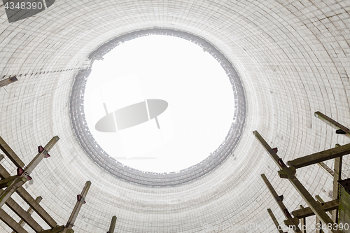 Image of Futuristic view inside of cooling tower of unfinished Chernobyl nuclear power plant