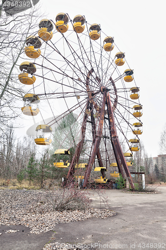 Image of Attraction in amusement park in overgrown ghost city Pripyat.