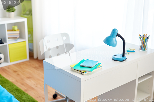 Image of kids room interior with table and school staff