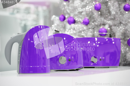 Image of Ultraviolet home appliances store at Christmas