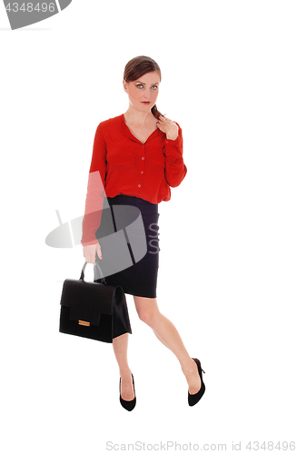 Image of Business woman with black purse.