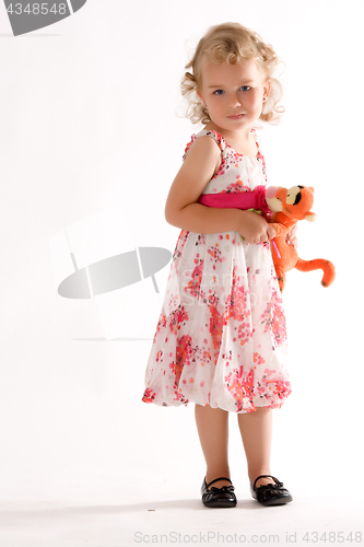 Image of Small child with stuffed animal