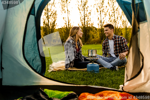 Image of Young couple camping