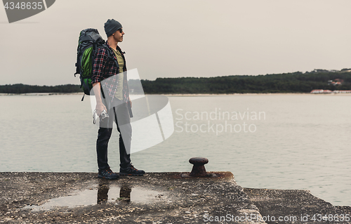 Image of Man Traveling Backpack