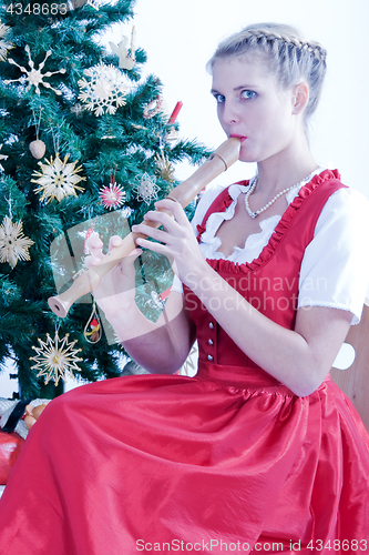 Image of Young woman with flute