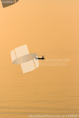 Image of Fishermen in the evening sun