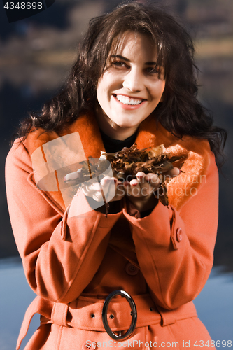 Image of Young woman with autumn mood