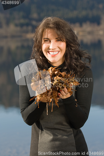 Image of Young woman with autumn mood