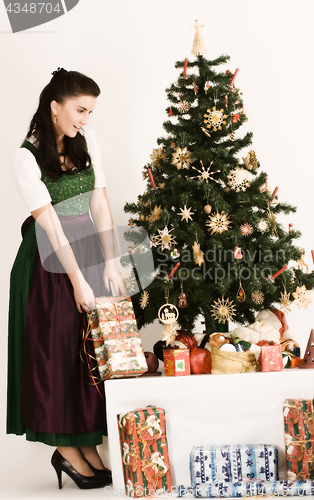 Image of Bavarian Girl with Christmas present