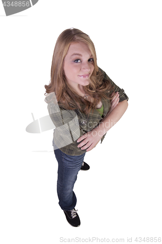 Image of Cute teenager with her arms crossed