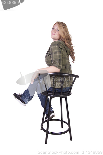 Image of Girl on a Chair Posing