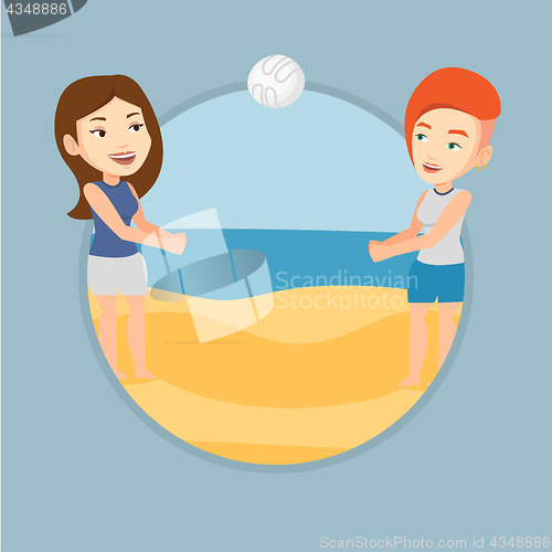 Image of Two women playing beach volleyball.
