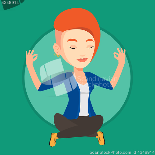 Image of Businesswoman meditating in lotus position.