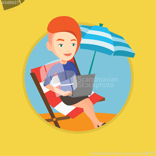 Image of Businesswoman working on laptop at the beach.