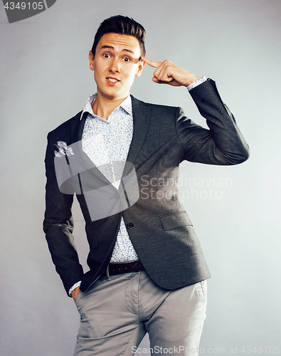 Image of young pretty businessman posing emotional on white background, l