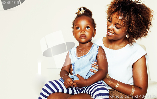 Image of adorable sweet young afro-american mother with cute little daugh