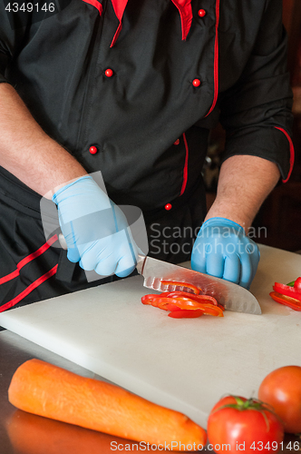 Image of Chef cutting vegetables