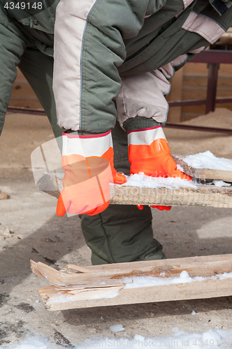 Image of Carpenter working at sawmill