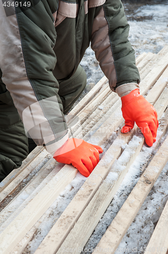 Image of Carpenter working at sawmill