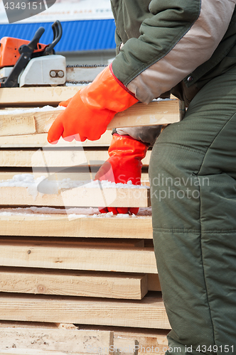 Image of Carpenter working at sawmill