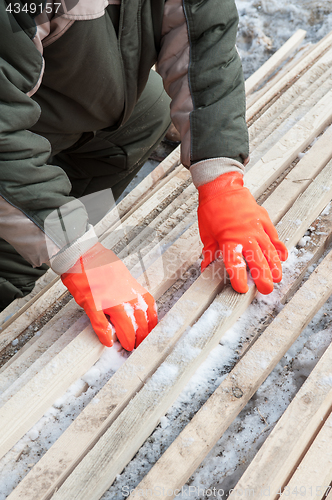 Image of Carpenter working at sawmill