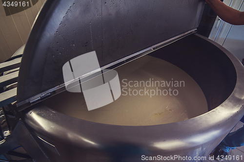 Image of Cheese production at dairy farm