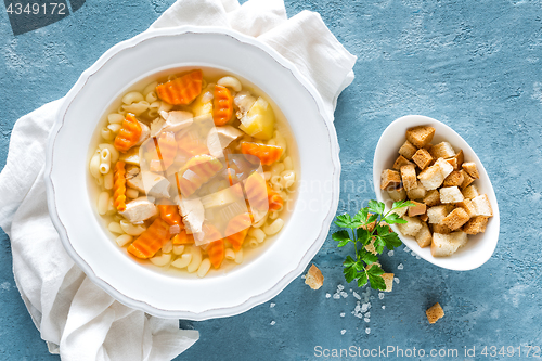 Image of Chicken soup, bouillon with meat, pasta and vegetables