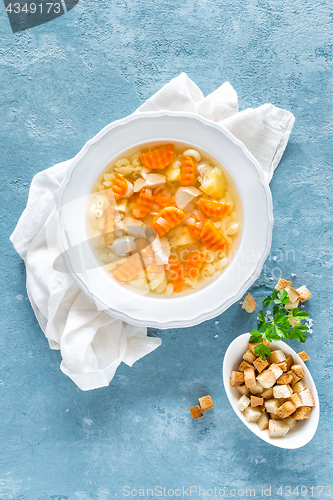 Image of Chicken soup, bouillon with meat, pasta and vegetables