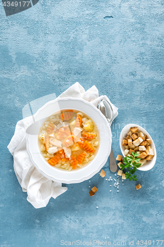 Image of Chicken soup, bouillon with meat, pasta and vegetables