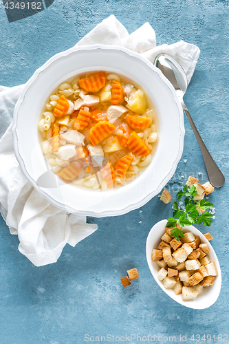 Image of Chicken soup, bouillon with meat, pasta and vegetables